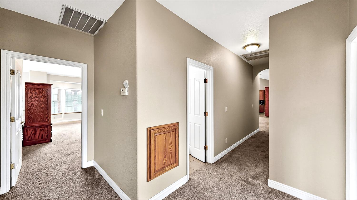 770 Merriam Road Hickman, CA 95323 - Photo 47 of 91 a view of a hallway with closet and a livingroom view