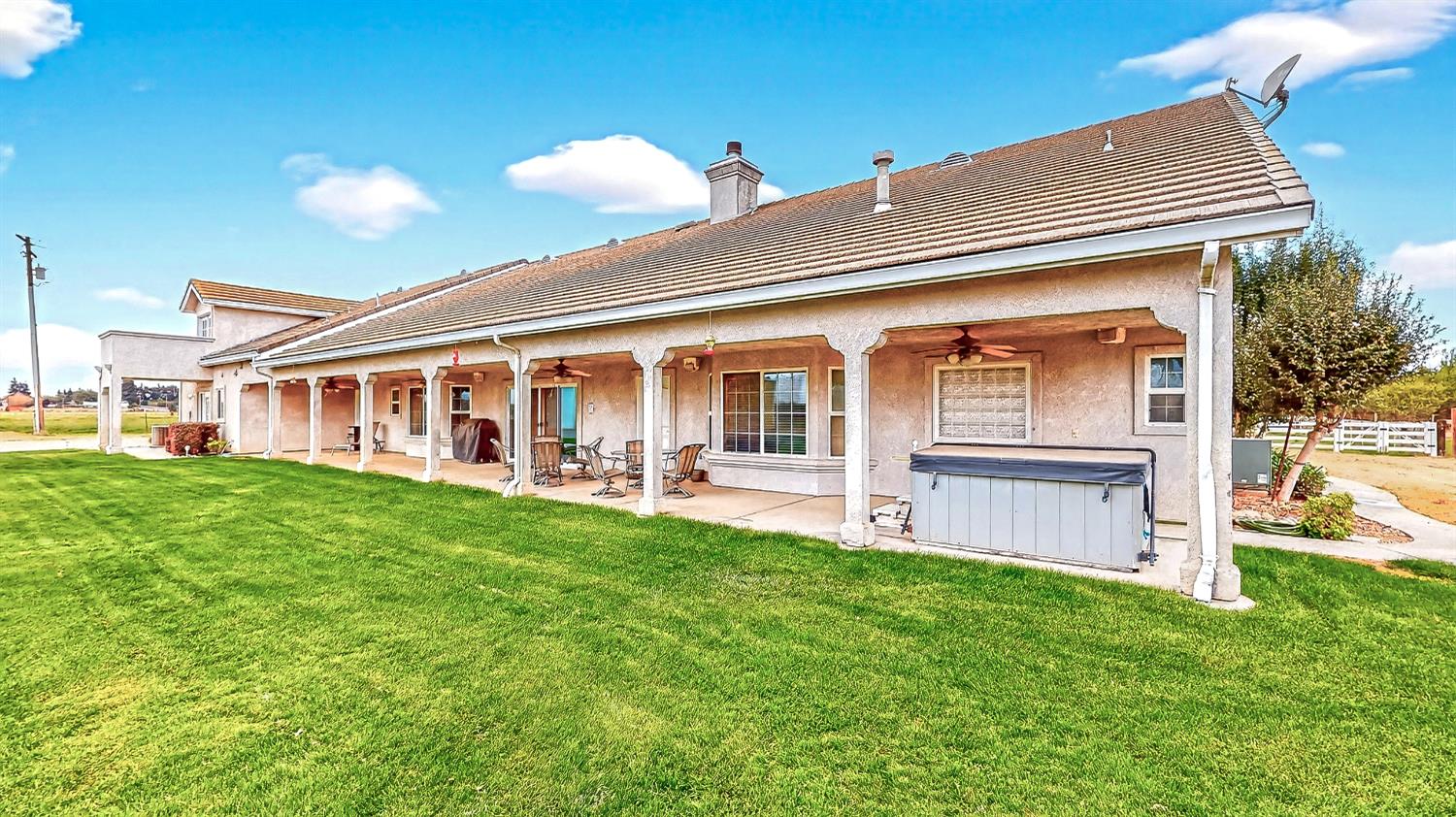 770 Merriam Road Hickman, CA 95323 - Photo 56 of 91 a view of a house with a backyard