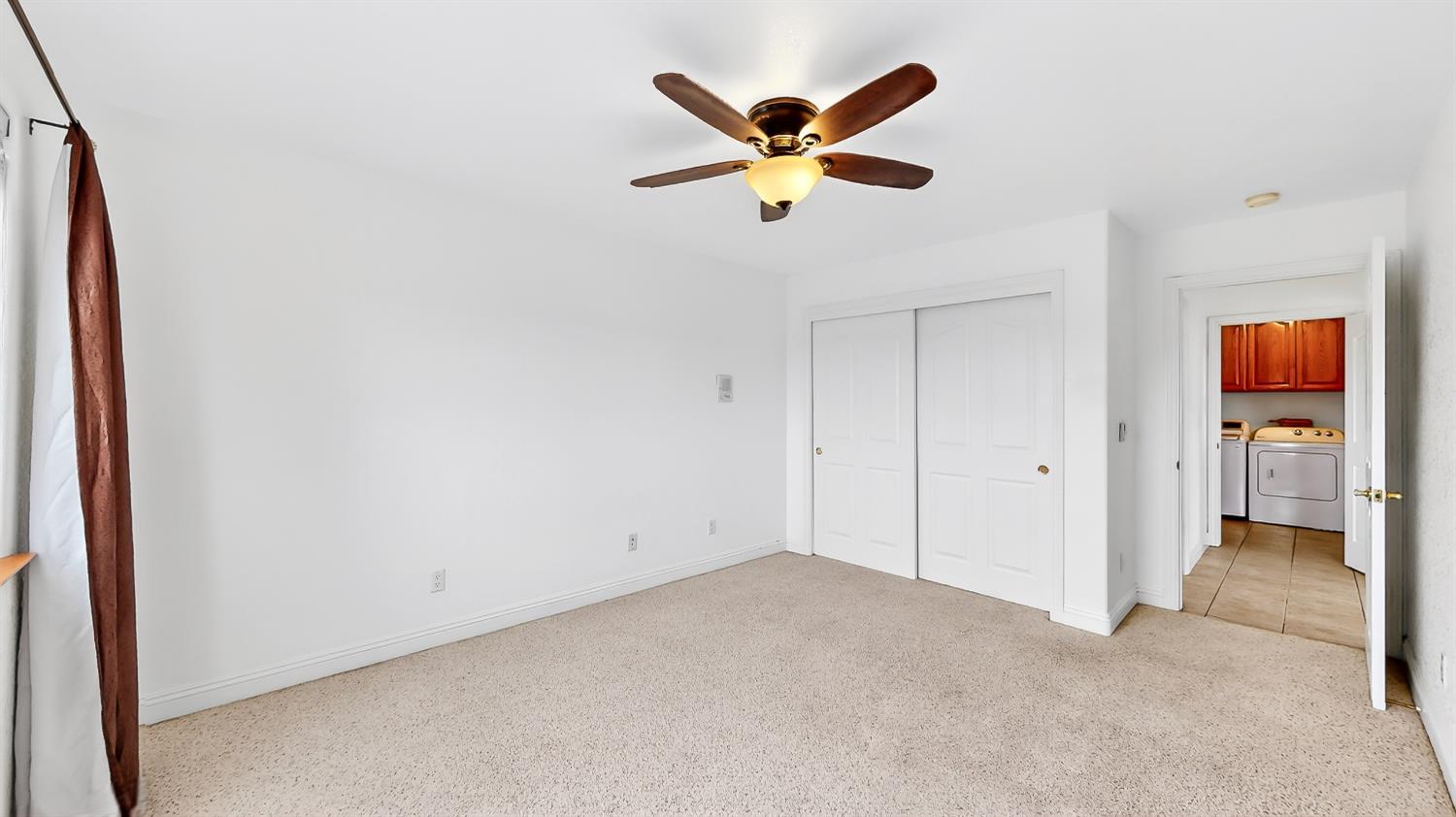 770 Merriam Road Hickman, CA 95323 - Photo 64 of 91 a view of a livingroom with a ceiling fan and window