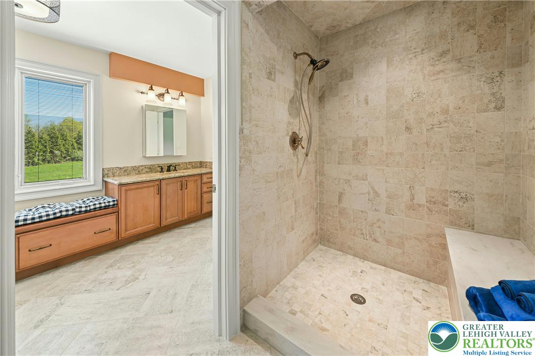 3200 Creamery Road New Hope, PA 18938 - Photo 30 of 42 a bathroom with a tub sink and mirror