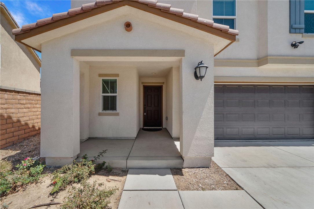 20130 Curaco Court Riverside, CA 92507 - Photo 10 of 43 Covered front porch with a recessed entry and direct walkway access.