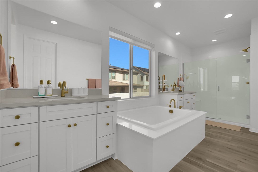 32136 Dymondia Way Temecula, CA 92591 - Photo 22 of 40 a white bath tub sitting next to a bathroom sink