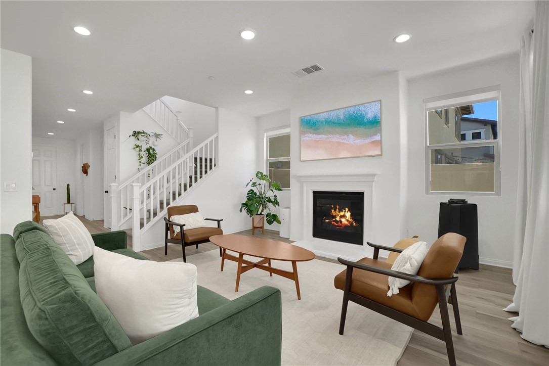 32136 Dymondia Way Temecula, CA 92591 - Photo 3 of 40 a living room with furniture and a fireplace