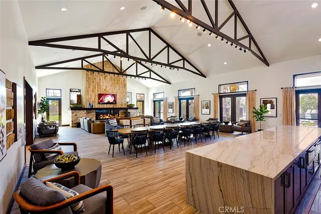 a dining hall with lots of tables a dining table and chairs with wooden floor