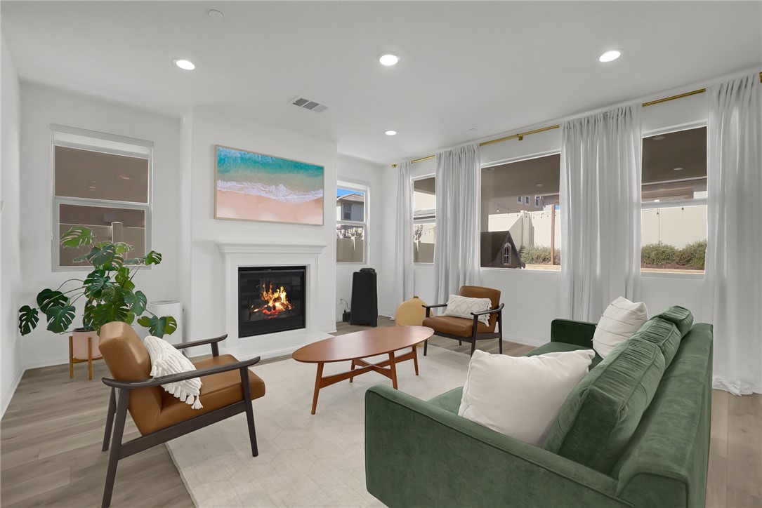 32136 Dymondia Way Temecula, CA 92591 - Photo 4 of 40 a living room with furniture and a fireplace