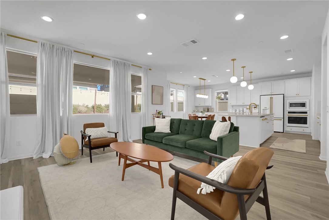 32136 Dymondia Way Temecula, CA 92591 - Photo 5 of 40 a living room with furniture and a large window