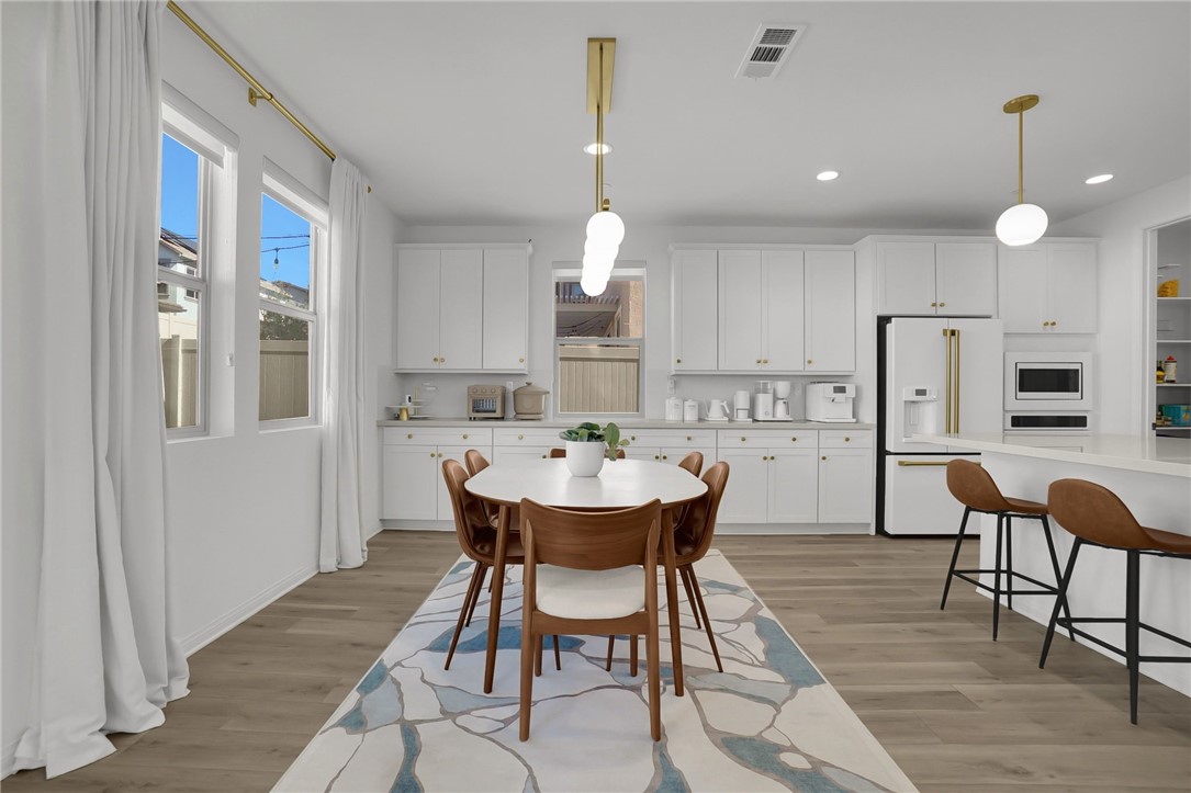 32136 Dymondia Way Temecula, CA 92591 - Photo 8 of 40 a view of a dining room with furniture and window