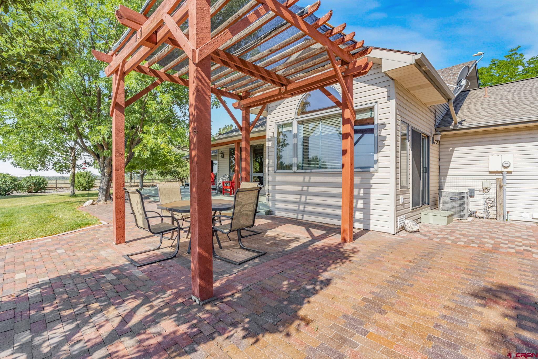 9113 Coogans Bluff Road Austin, CO 81410 - Photo 16 of 22 a view of a backyard with a patio