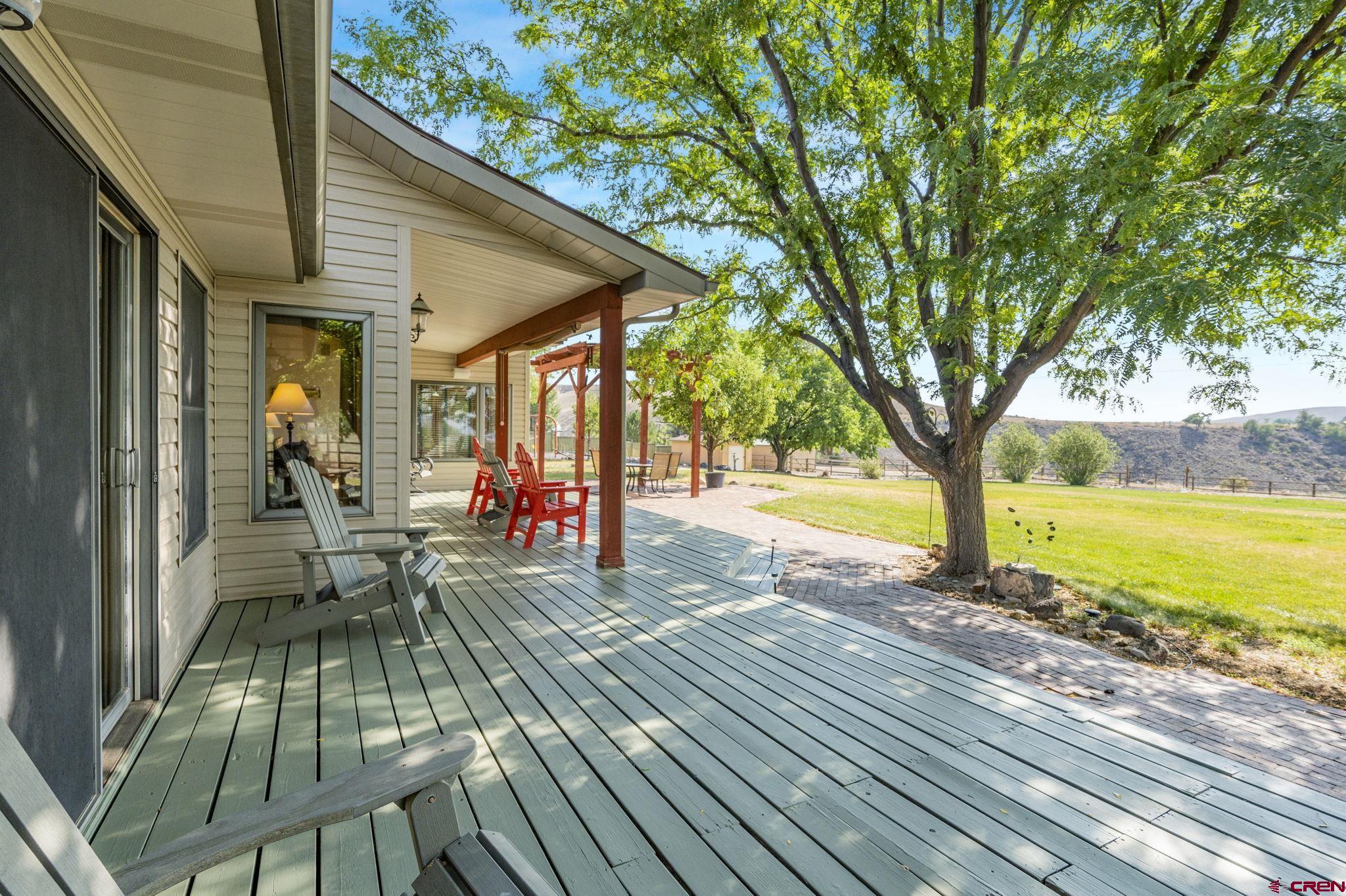 9113 Coogans Bluff Road Austin, CO 81410 - Photo 18 of 22 a view of a swimming pool with a patio