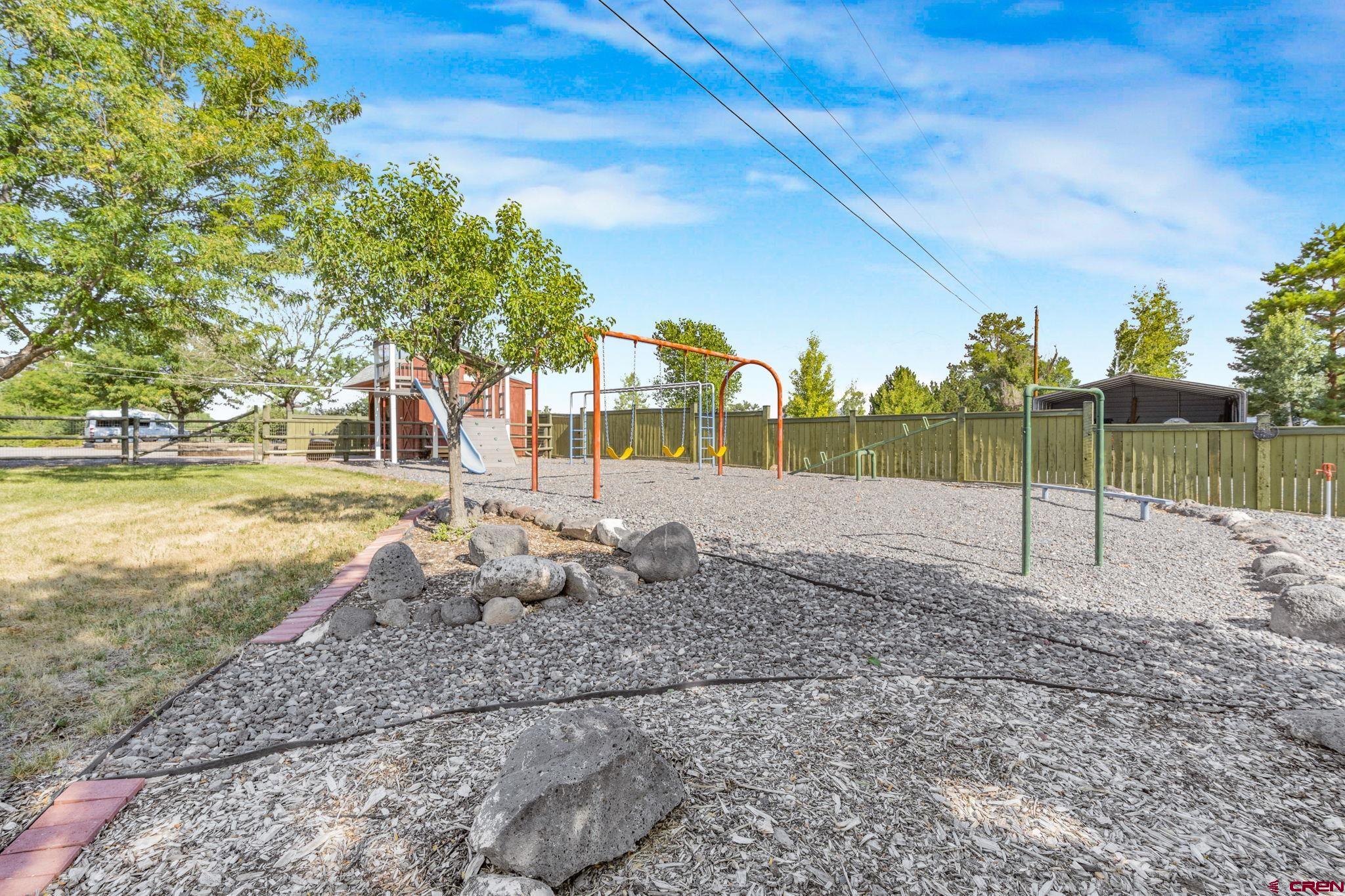 9113 Coogans Bluff Road Austin, CO 81410 - Photo 20 of 22 a view of a park with large trees
