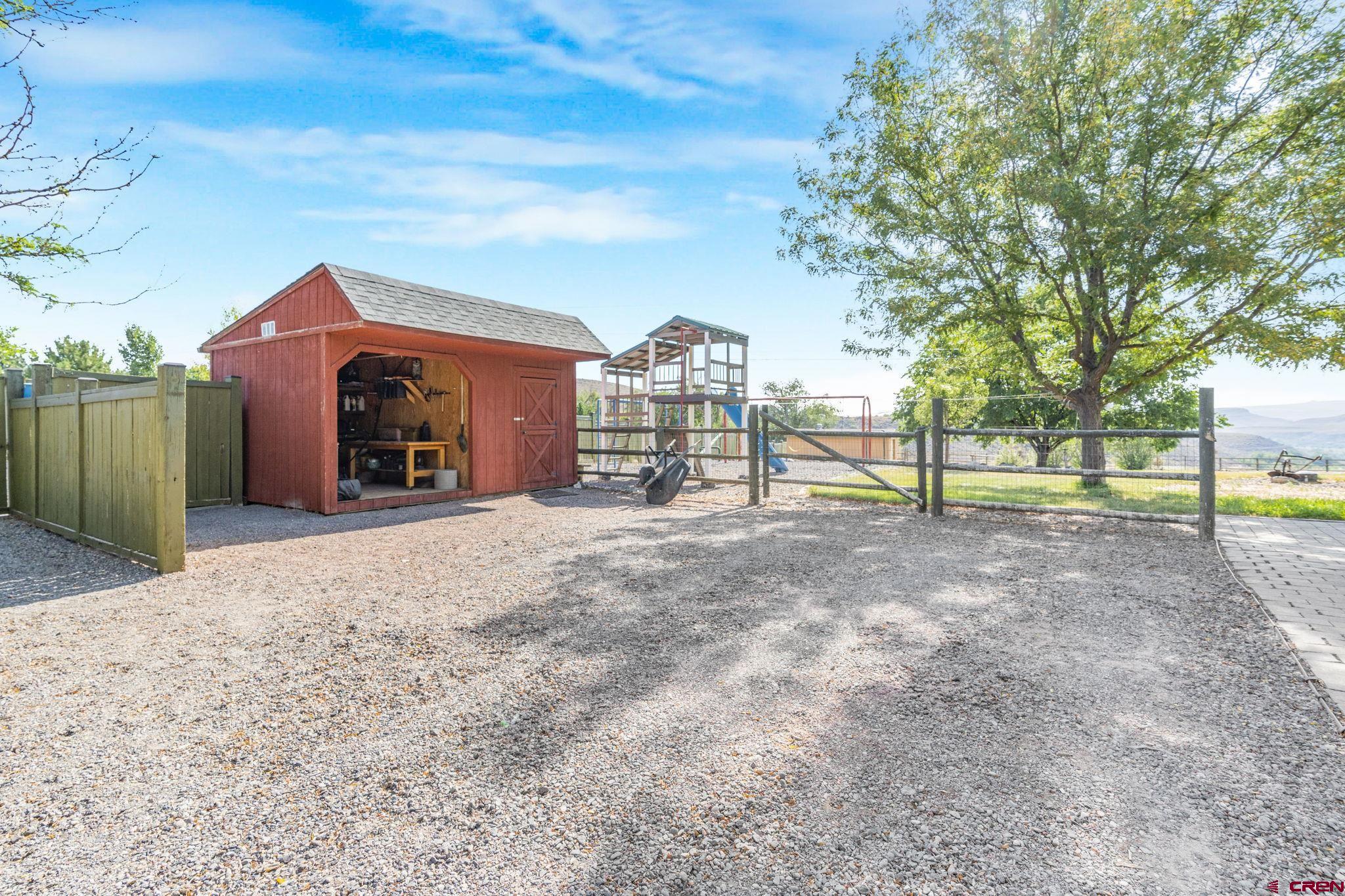 9113 Coogans Bluff Road Austin, CO 81410 - Photo 21 of 22 a view of a house with a yard