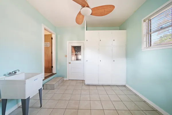 a view of an empty room and window