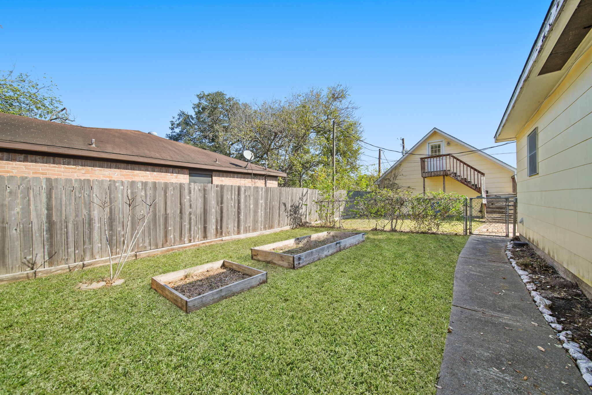 1811 Mulcahy Street Rosenberg, TX 77471 - Photo 20 of 25 a view of a backyard with sitting area