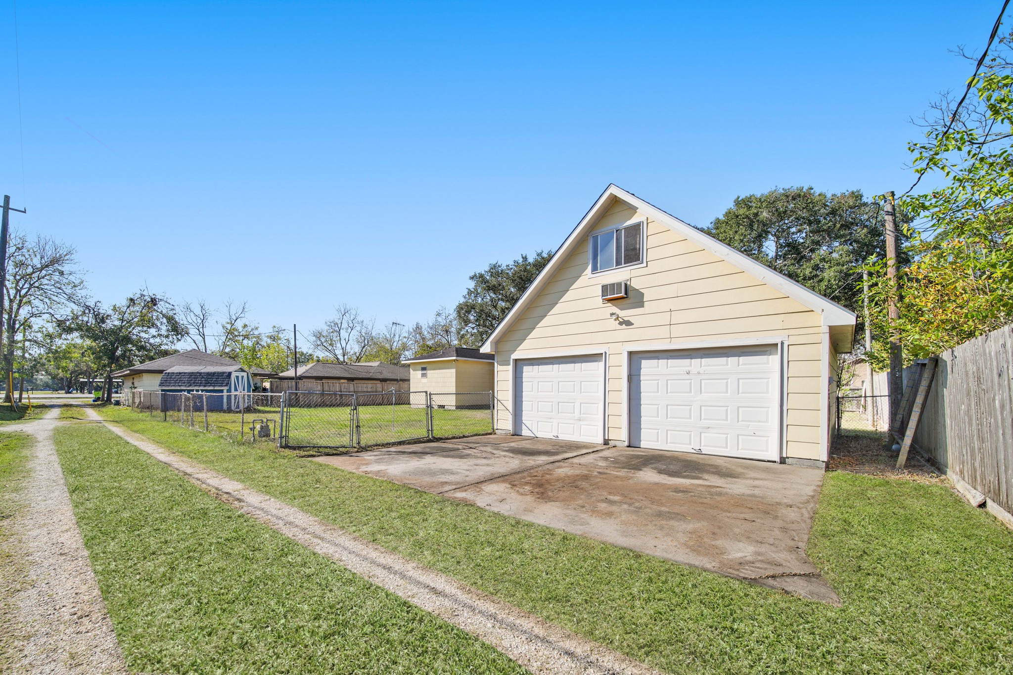 1811 Mulcahy Street Rosenberg, TX 77471 - Photo 24 of 25 a view of a house with a yard and sitting area