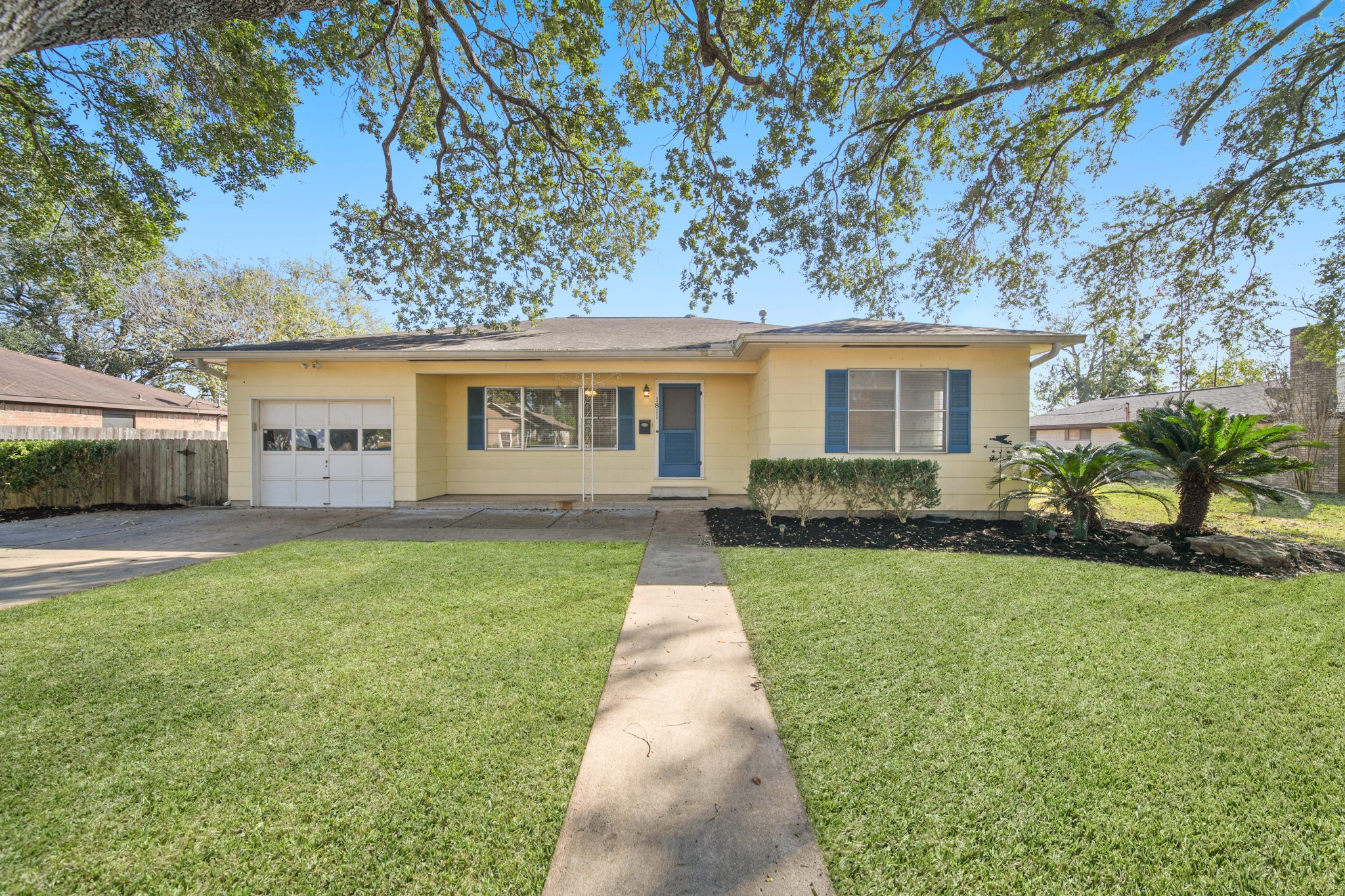 1811 Mulcahy Street Rosenberg, TX 77471 - Photo 3 of 25 a view of a house with a yard