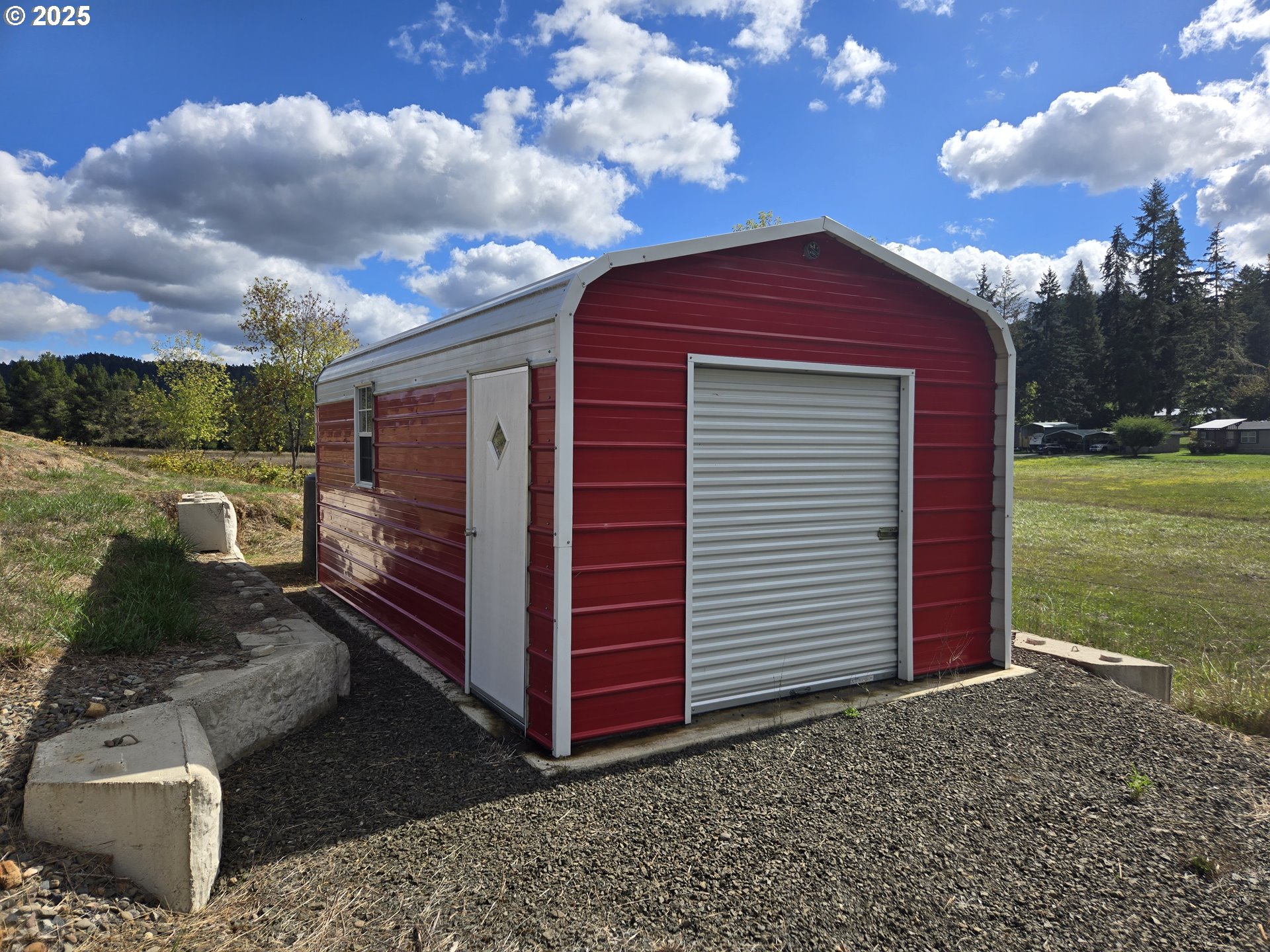 740 Ireland Road Winston, OR 97496 - Photo 11 of 18 a front view of a house with a yard