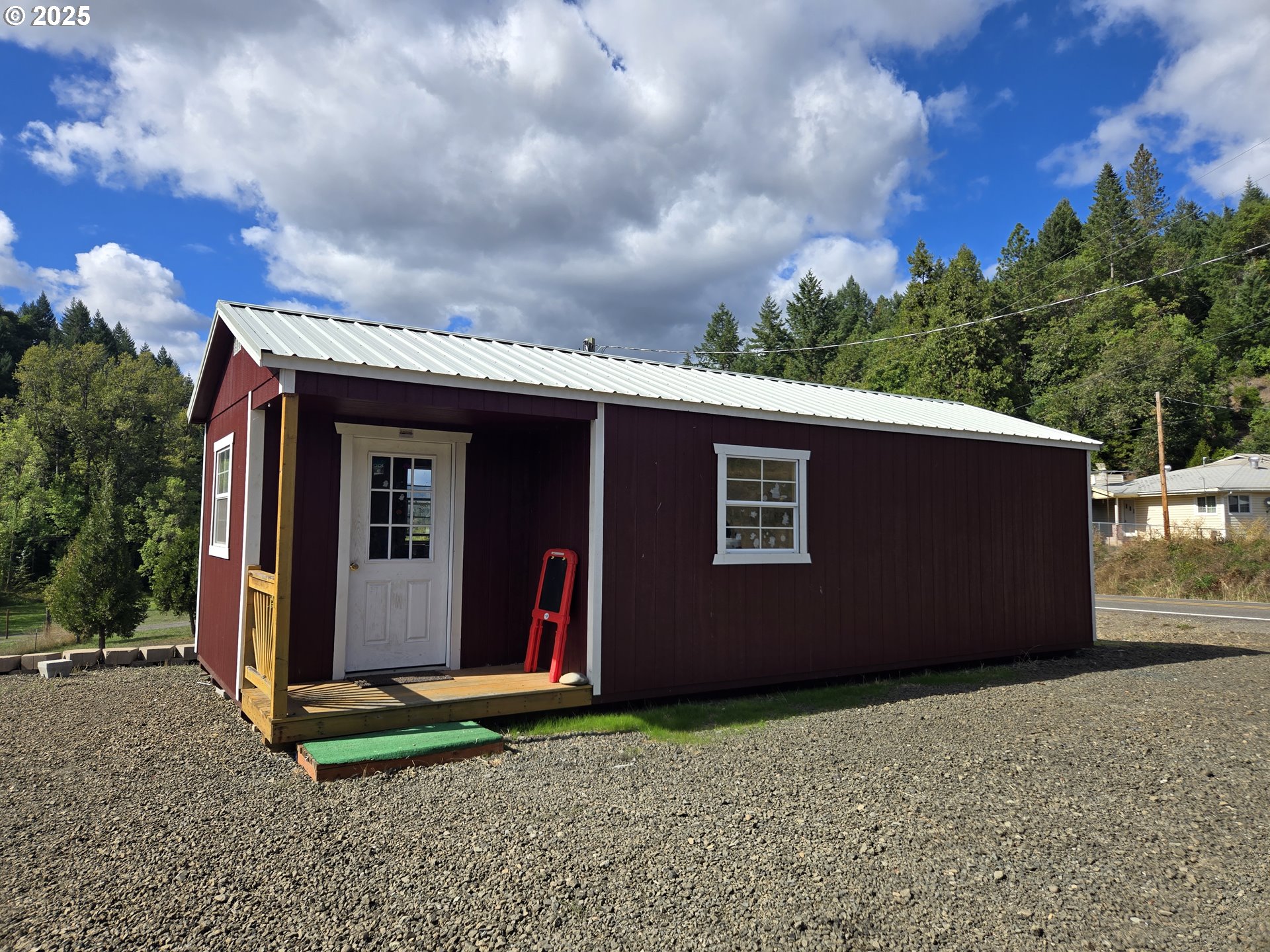 740 Ireland Road Winston, OR 97496 - Photo 3 of 18 a view of a small house