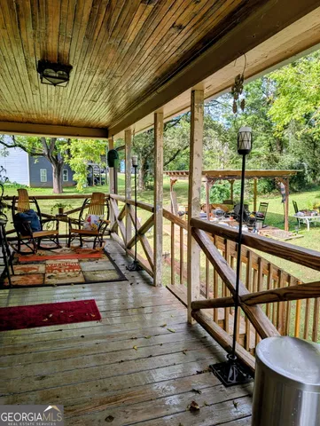 a view of swimming pool with patio