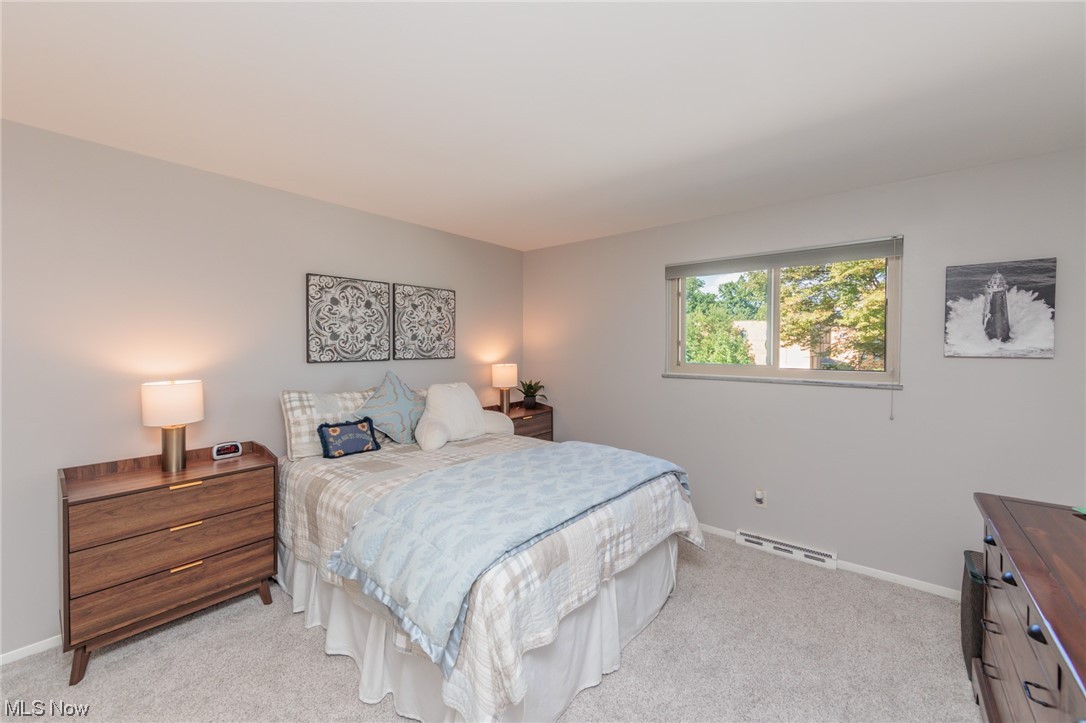1750 Wagar Road, Unit 206 Rocky River, OH 44116 - Photo 21 of 33 Carpeted bedroom with baseboard heating