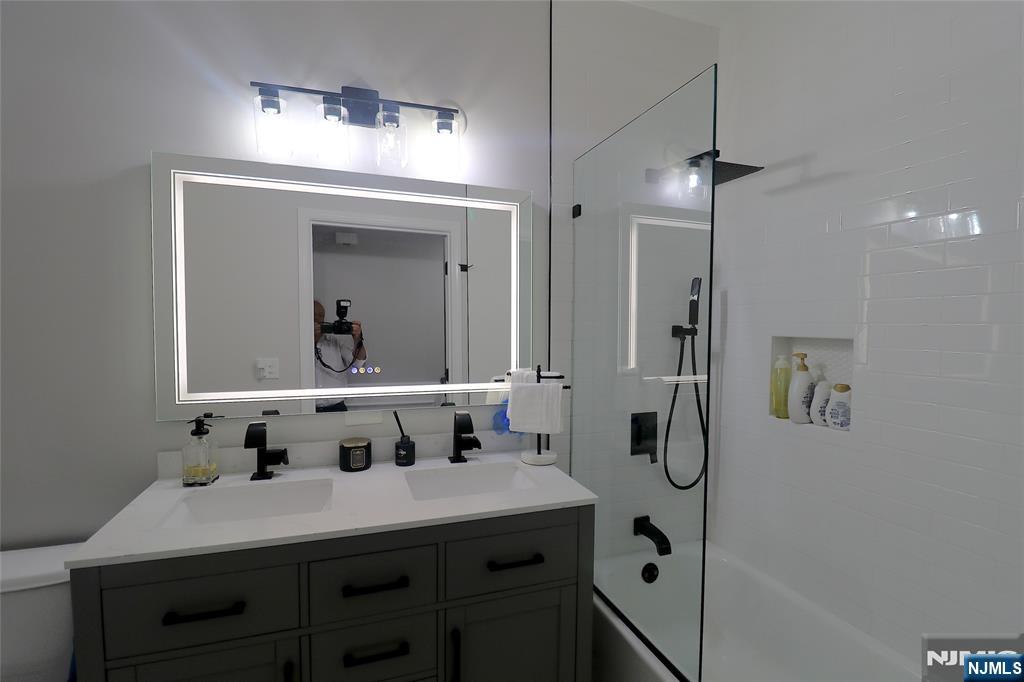 163 Conover Terrace Lebanon, NJ 08833 - Photo 11 of 23 a bathroom with a sink and a mirror