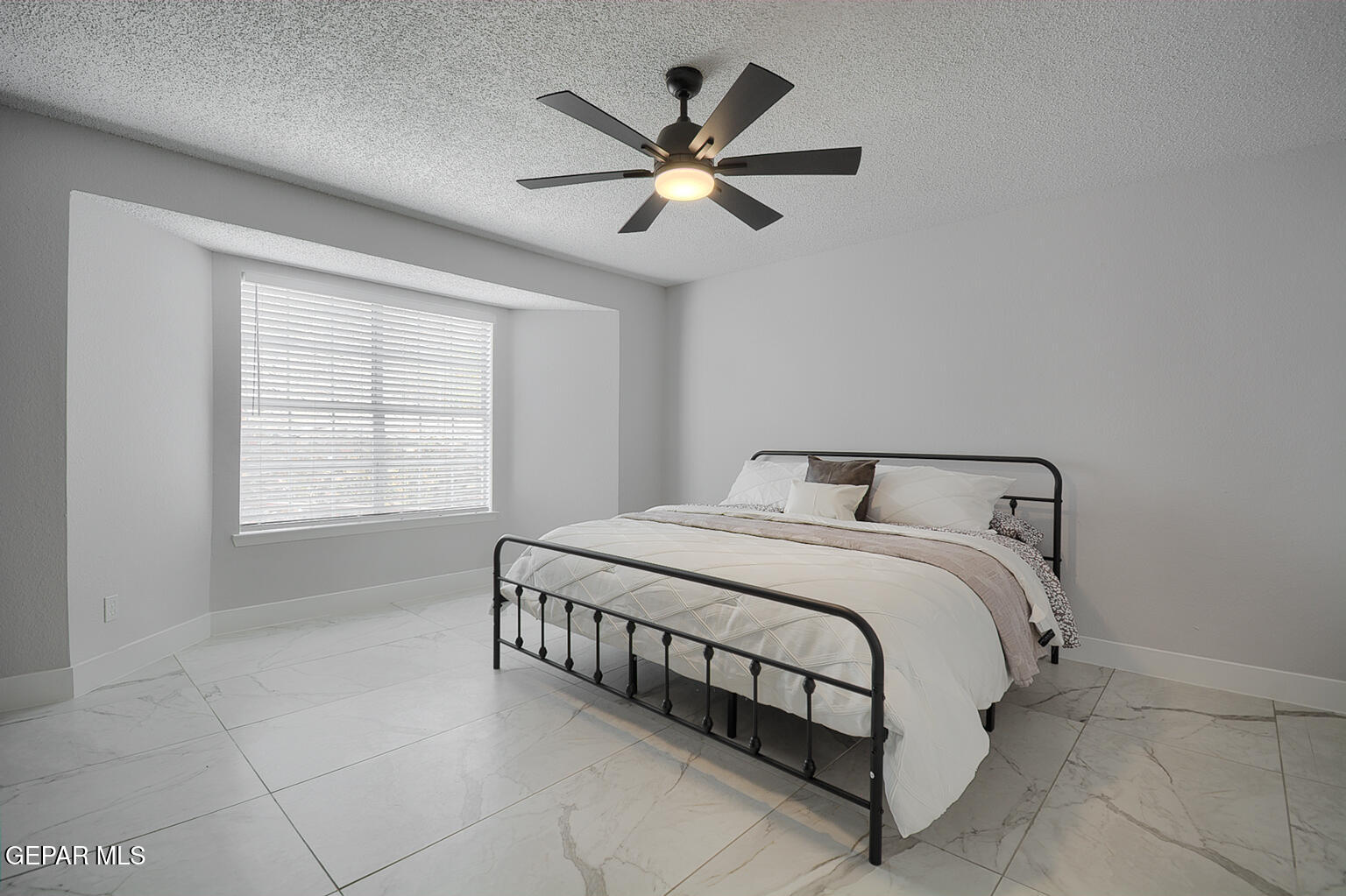 7413 Le Conte Drive El Paso, TX 79912 - Photo 28 of 50 a bedroom with a bed and window