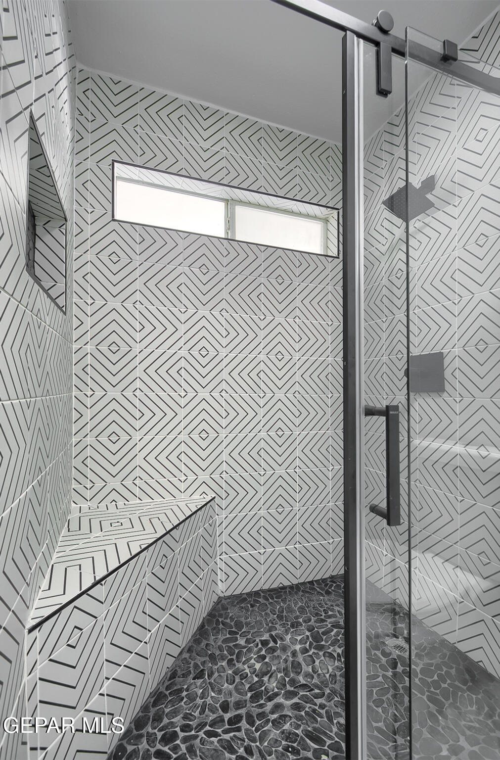 7413 Le Conte Drive El Paso, TX 79912 - Photo 32 of 50 a bathroom with a shower