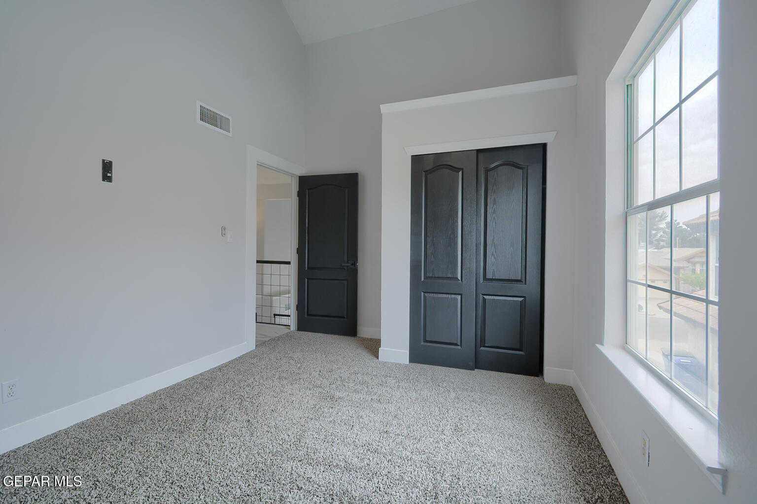 7413 Le Conte Drive El Paso, TX 79912 - Photo 36 of 50 a view of an empty room with a window