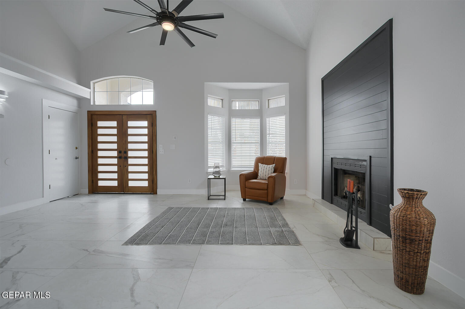 7413 Le Conte Drive El Paso, TX 79912 - Photo 7 of 50 a living room with furniture and a fireplace