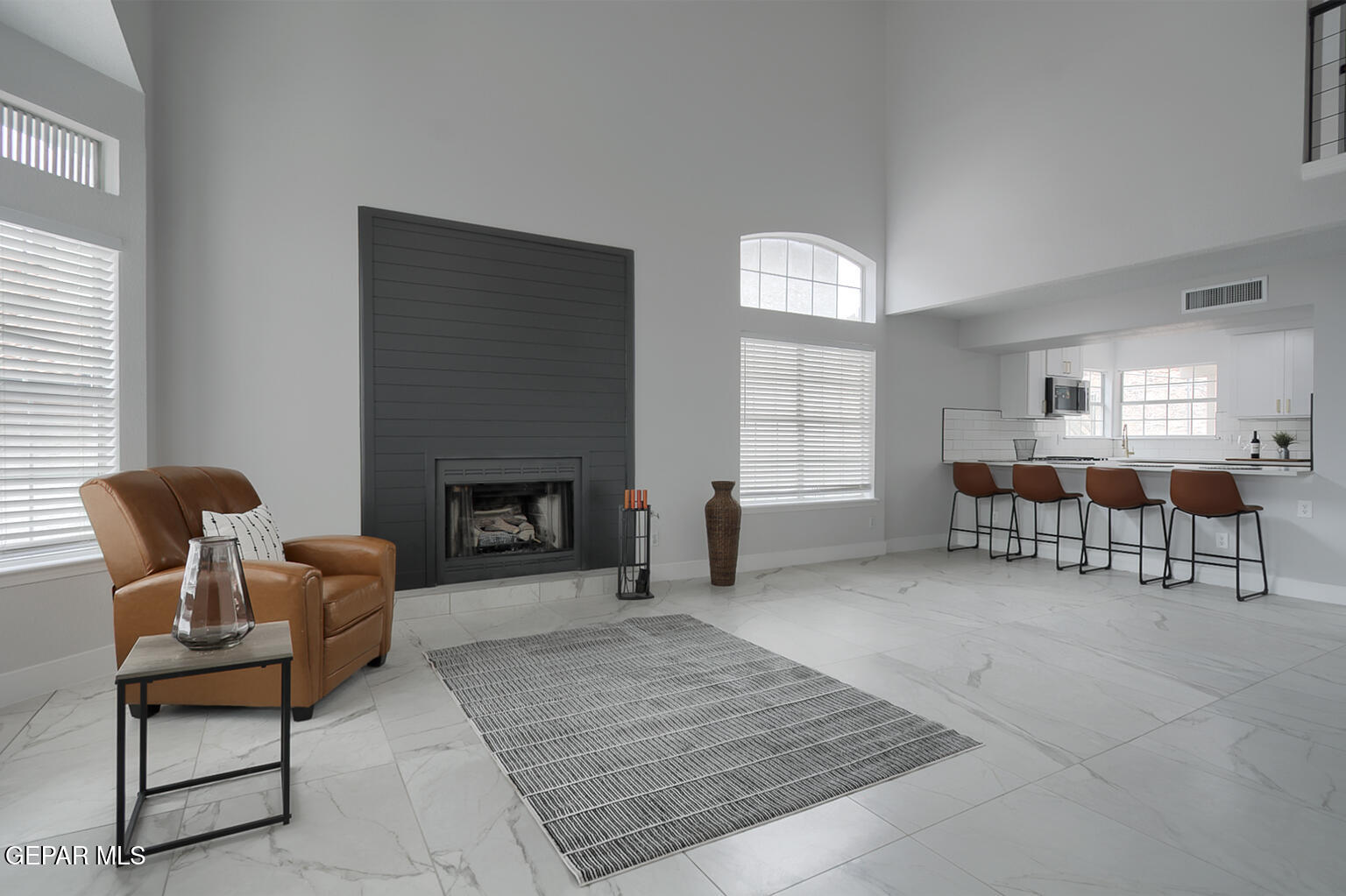 7413 Le Conte Drive El Paso, TX 79912 - Photo 10 of 50 a living room with furniture and a fireplace