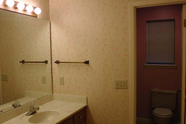 3845 Poverty Creek Road Crestview, FL 32539 - Photo 18 of 32 a bathroom with a sink and toilet