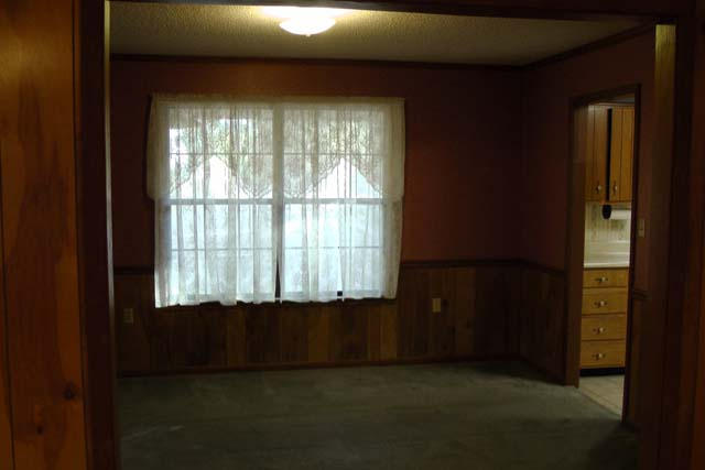 3845 Poverty Creek Road Crestview, FL 32539 - Photo 4 of 32 a view of an empty room with a window