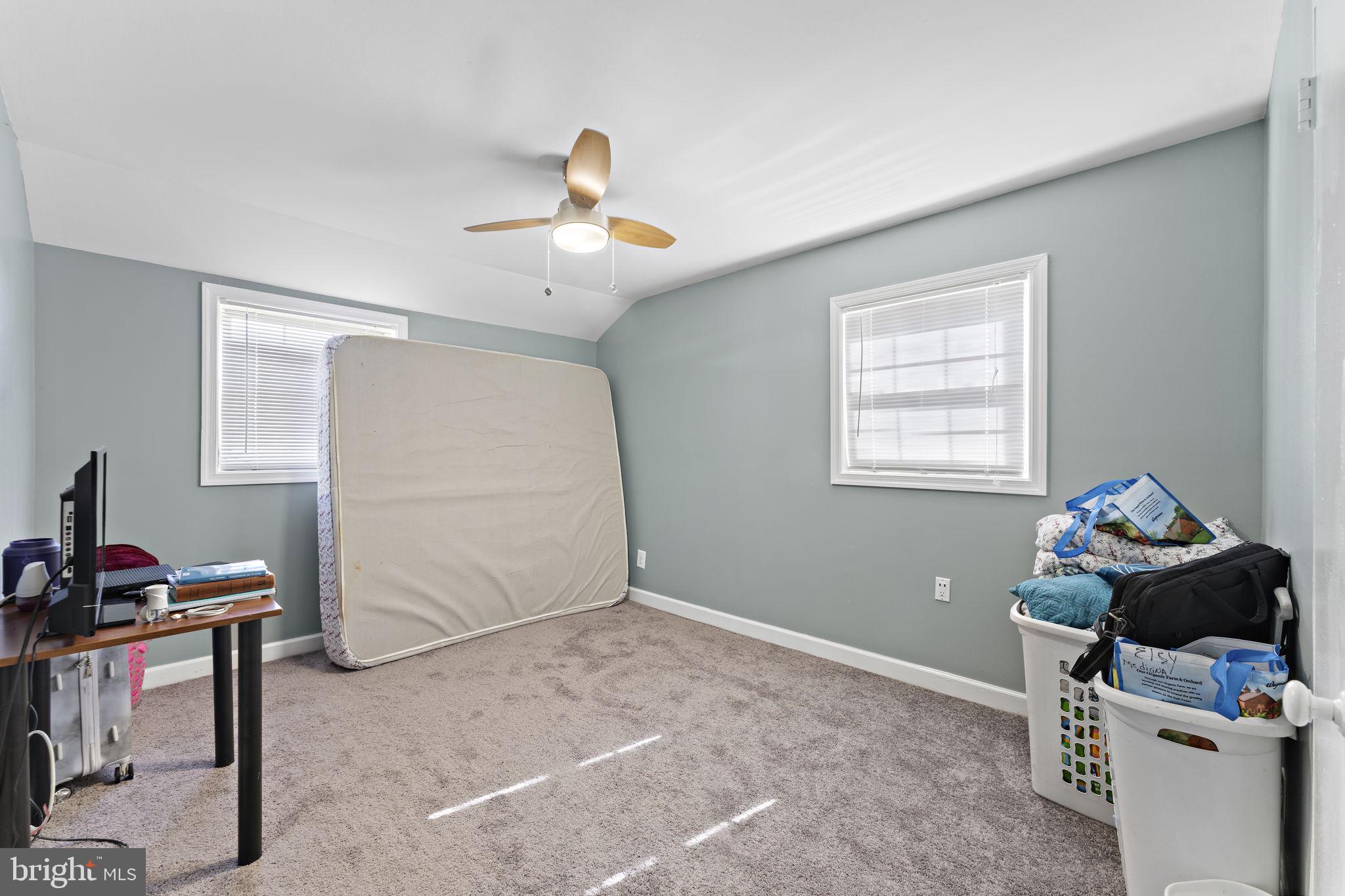 12911 Valleywood Drive Silver Spring, MD 20906 - Photo 15 of 43 a livingroom with workspace and a window