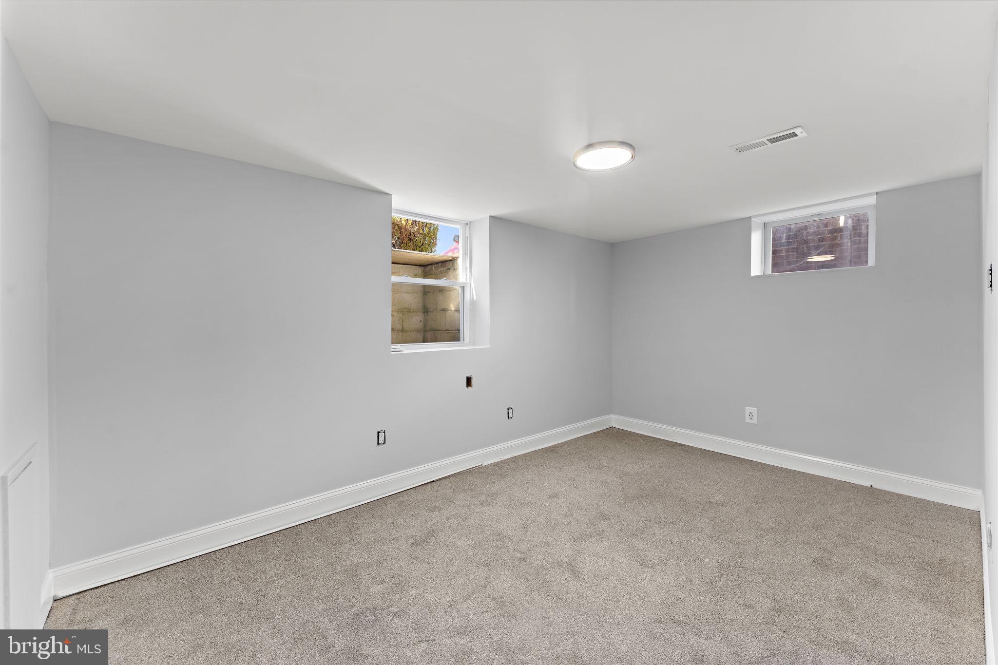 12911 Valleywood Drive Silver Spring, MD 20906 - Photo 25 of 43 an empty room with a window