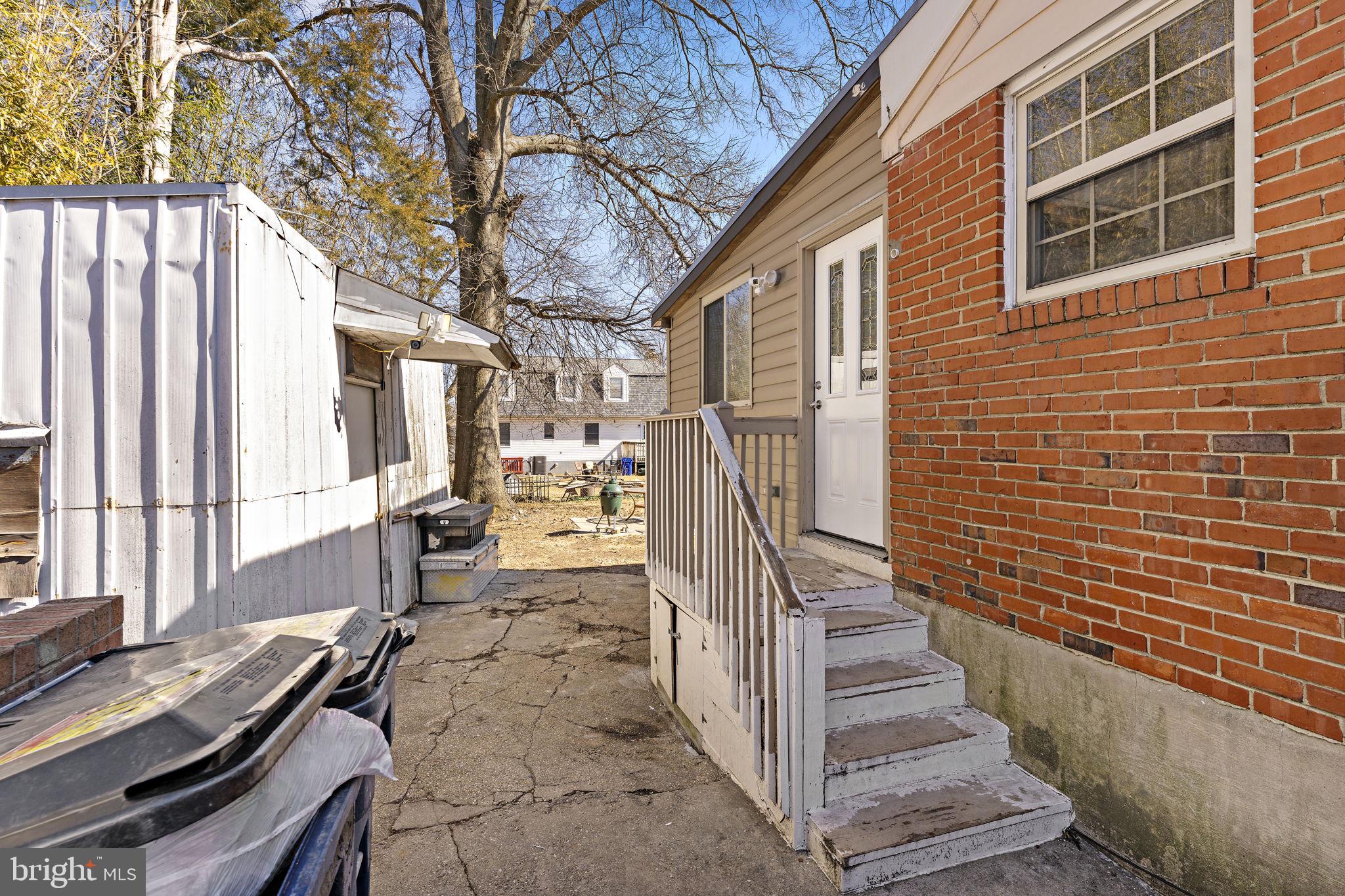 12911 Valleywood Drive Silver Spring, MD 20906 - Photo 33 of 43 a view of outdoor space deck and kitchen