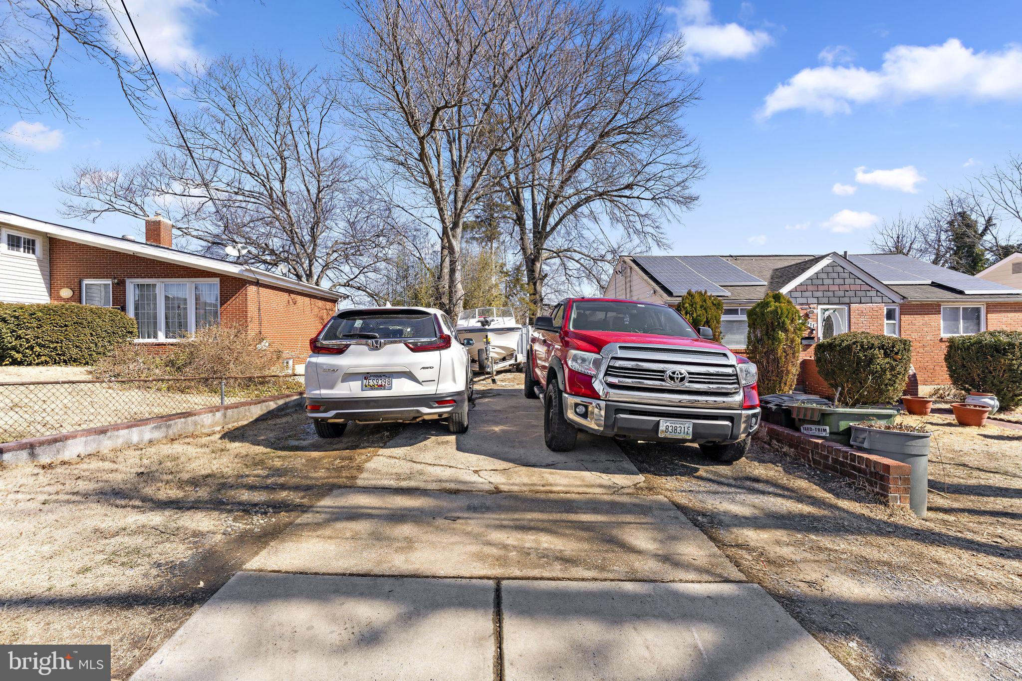12911 Valleywood Drive Silver Spring, MD 20906 - Photo 34 of 43 a car parked in front of house