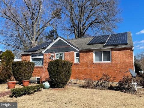 12911 Valleywood Drive Silver Spring, MD 20906 - Photo 42 of 43 a front view of a house with a yard