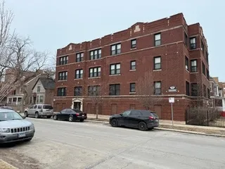 a car parked in front of a building