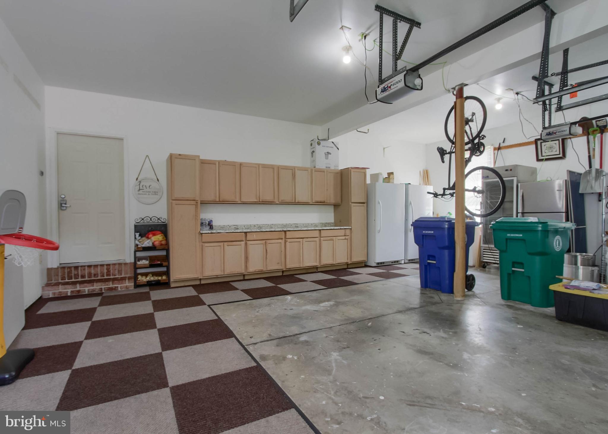 6542 Windmere Road Harrisburg, PA 17111 - Photo 54 of 59 Oversized 2 car garage with extra cabinet storage