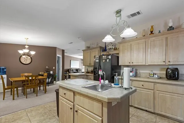 a dining room with furniture a window and a clock