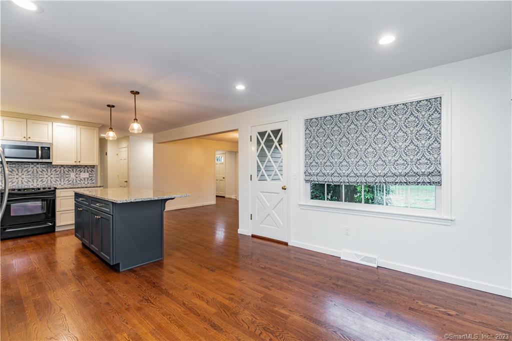 1241 Halladay Avenue West Suffield, CT 06078 - Photo 7 of 29 a living room with hard wood floors and a wooden floors