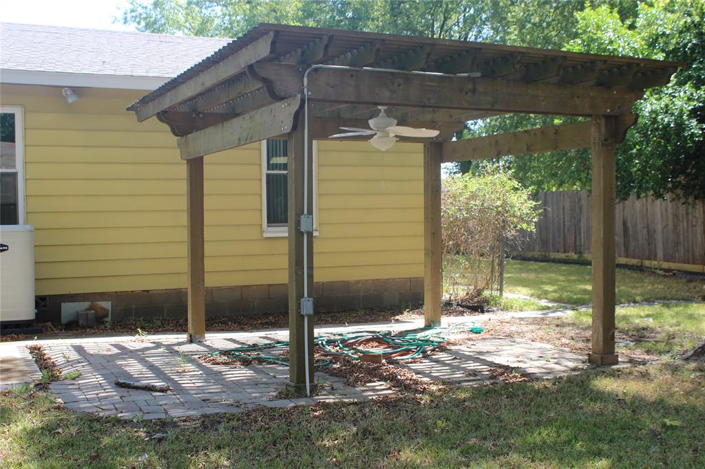 409 West Main Street Azle, TX 76020 - Photo 11 of 12 a view of a house with a yard