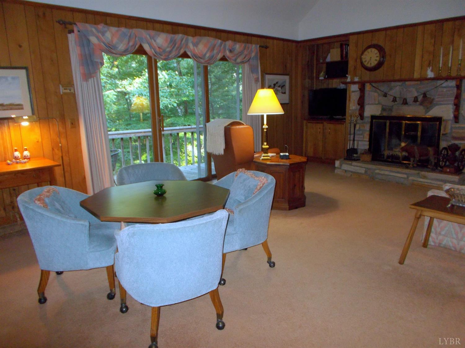 110 River Road Altavista, VA 24517 - Photo 22 of 51 a living room with furniture and a fireplace
