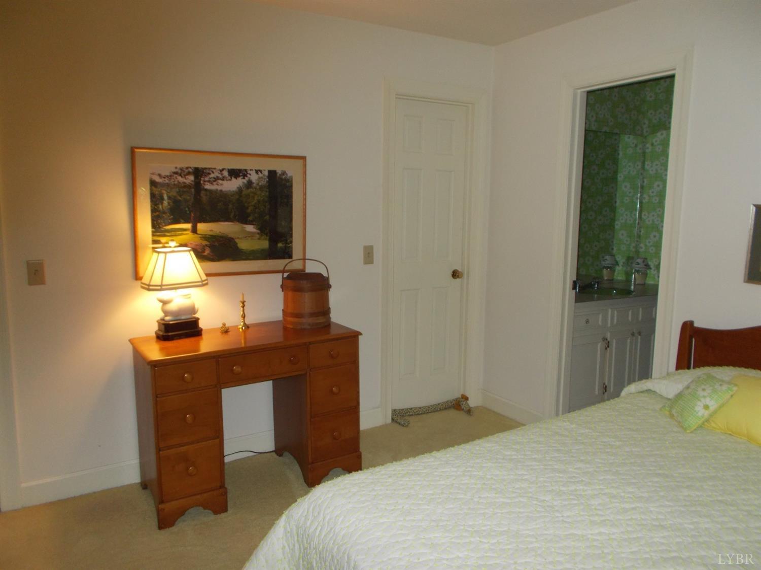 110 River Road Altavista, VA 24517 - Photo 39 of 51 a bedroom with a bed and a desk