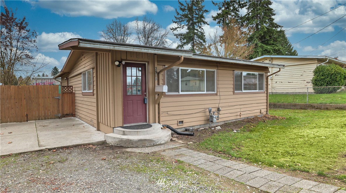 2519 Northeast 9th Street Renton, WA 98056 - Photo 3 of 26 a view of a house with a yard