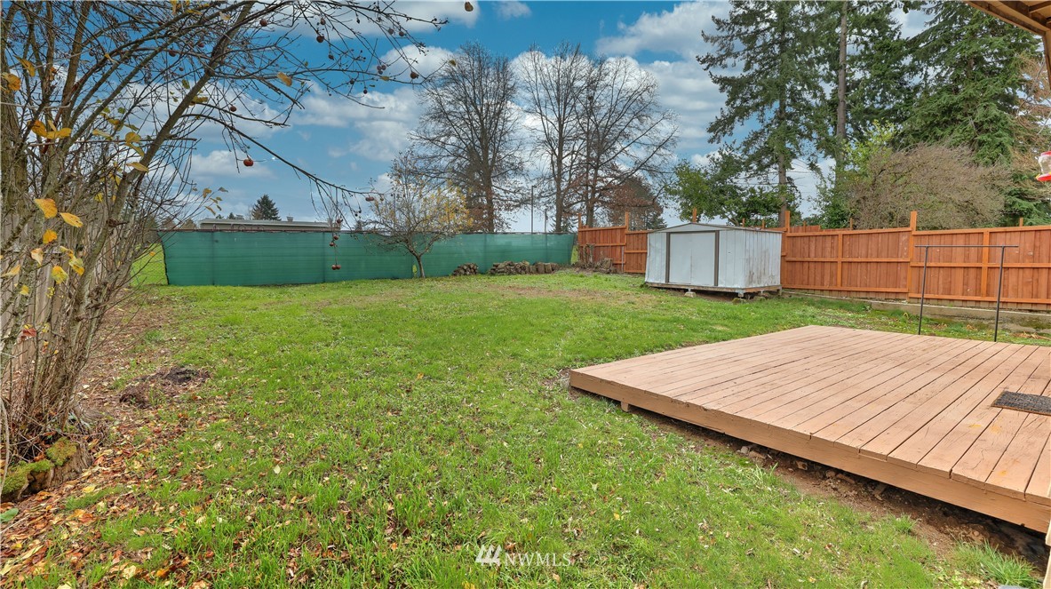 2519 Northeast 9th Street Renton, WA 98056 - Photo 23 of 26 a view of a backyard with wooden fence