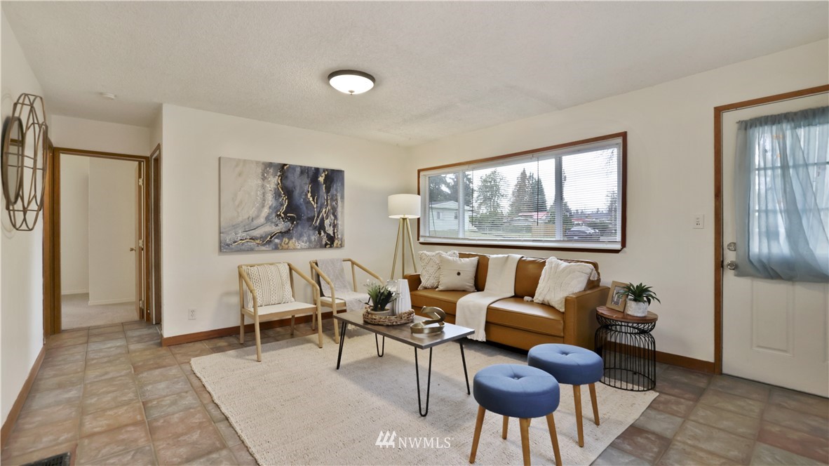 2519 Northeast 9th Street Renton, WA 98056 - Photo 4 of 26 a living room with furniture and a window