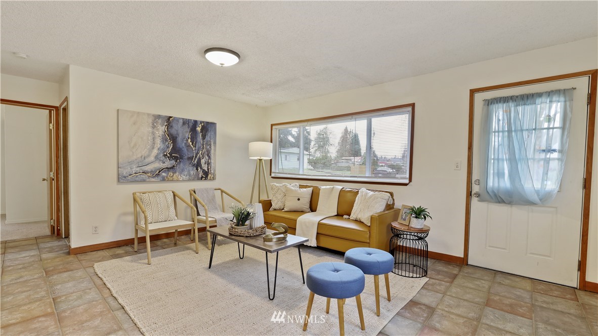 2519 Northeast 9th Street Renton, WA 98056 - Photo 7 of 26 a living room with furniture and a window