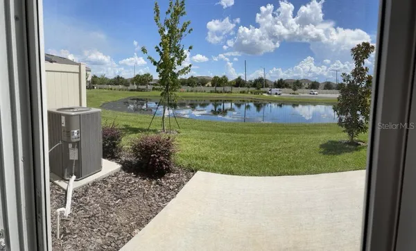 a view of a garden with a lake