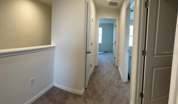 view of a bathroom from a hallway