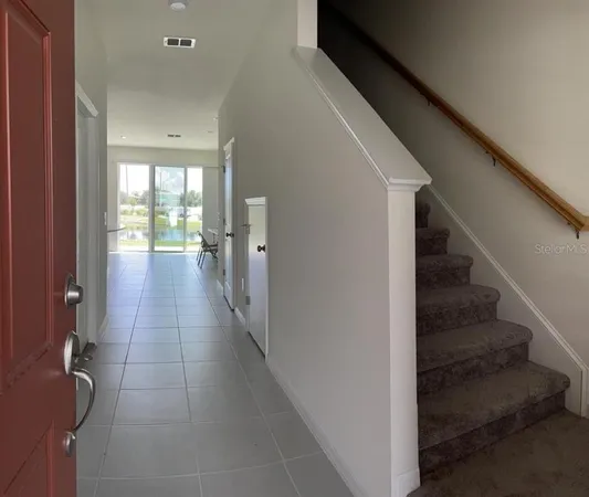 a view of hallway with stairs